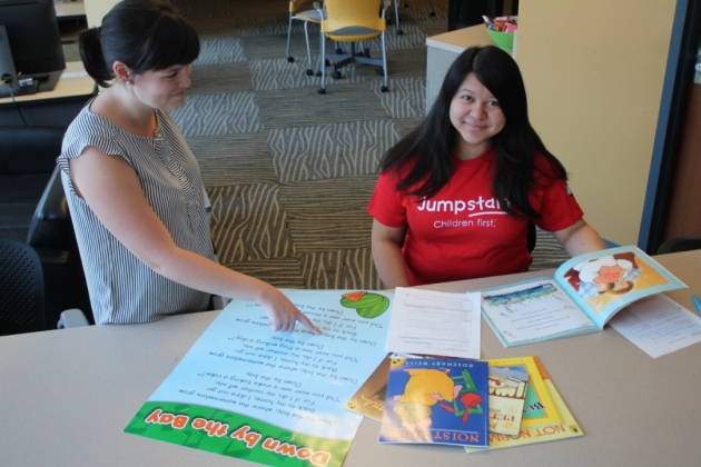 A teacher mentors a GT Jumpstart student volunteer.
